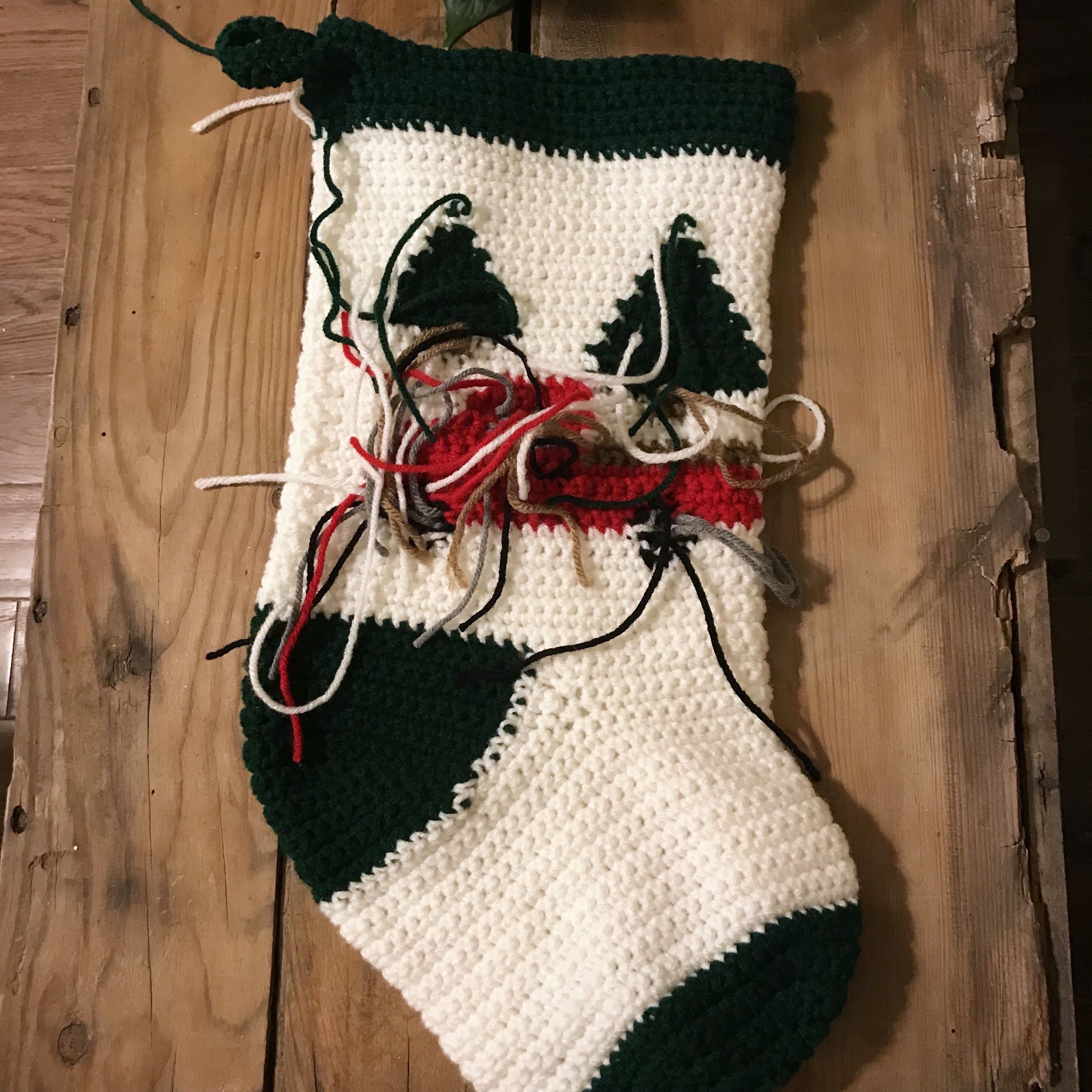 The inside of a Christmas stocking before the ends are woven in
